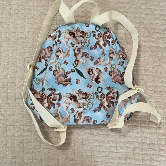JanSport Half Pint Blue Cherub Print Backpack - Picture 3 of 3